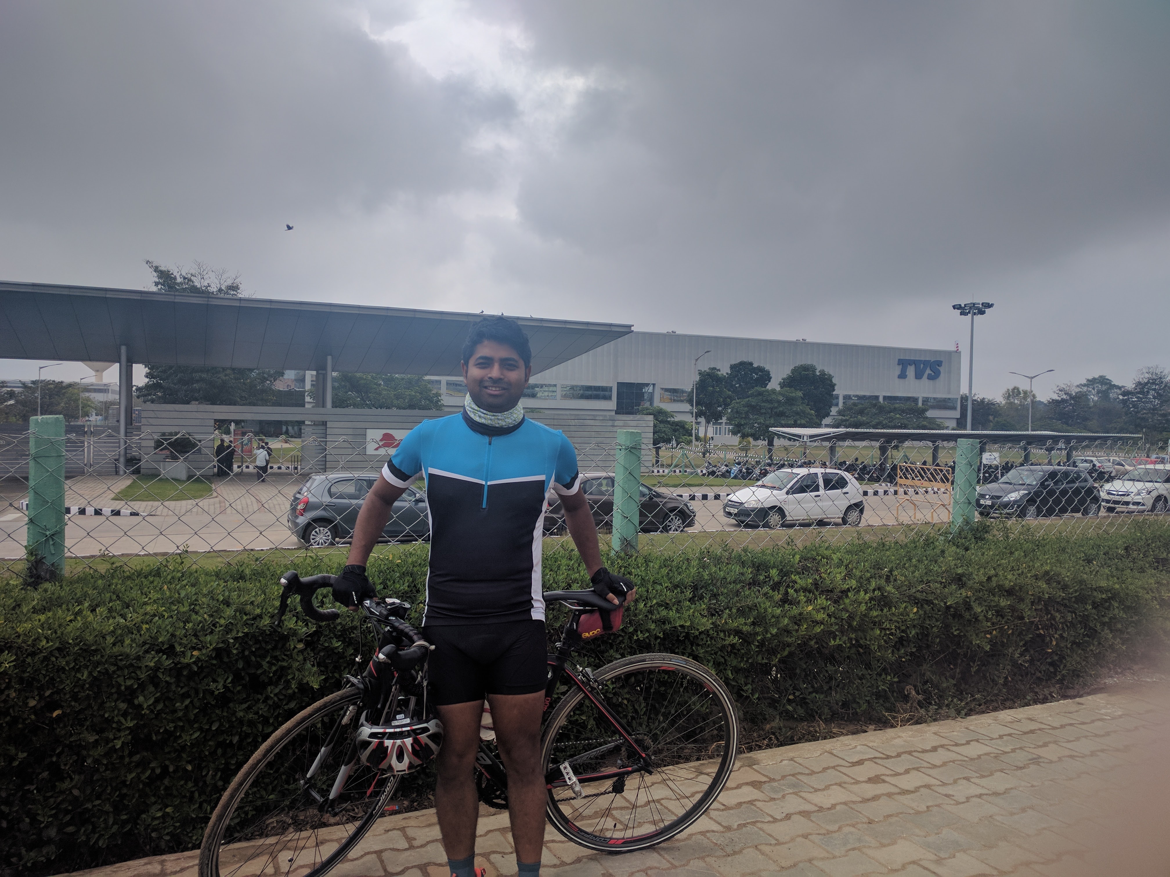 Mogit took this photograph of me in front of TVS&rsquo;s three wheeler factory located about 300 metres from the two wheeler one.