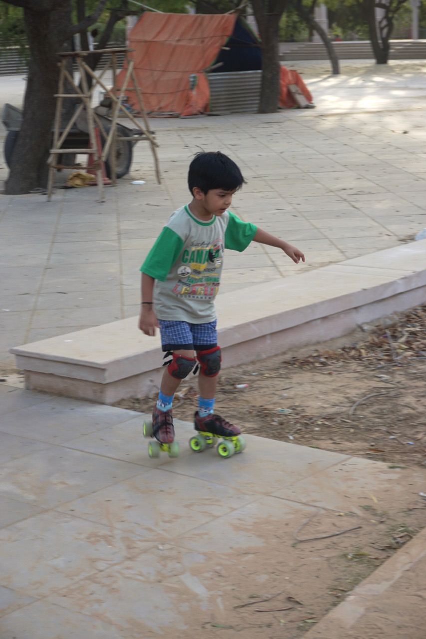 A kid practices his skating.