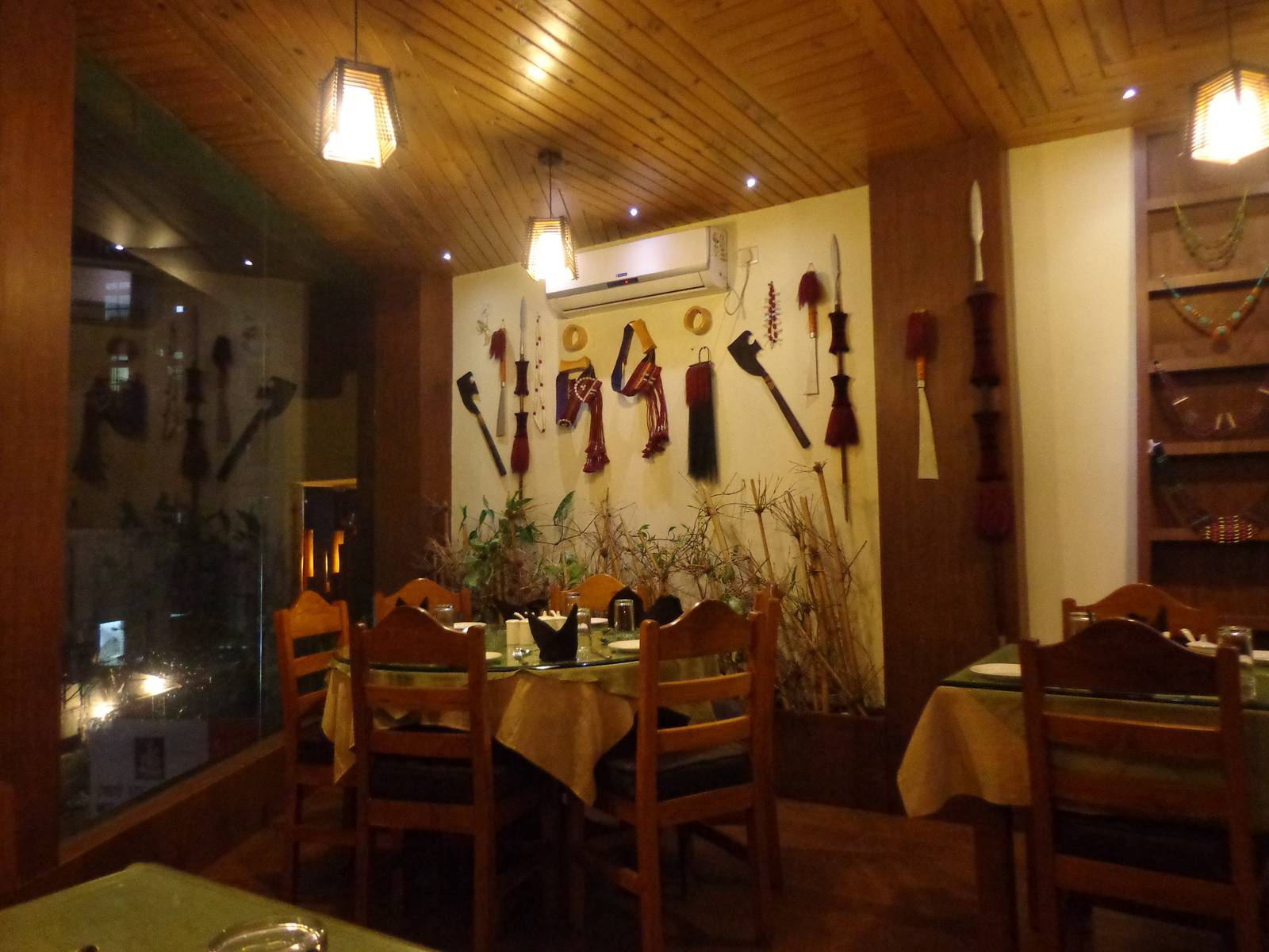 Naga weapons and jewellery used as decor.