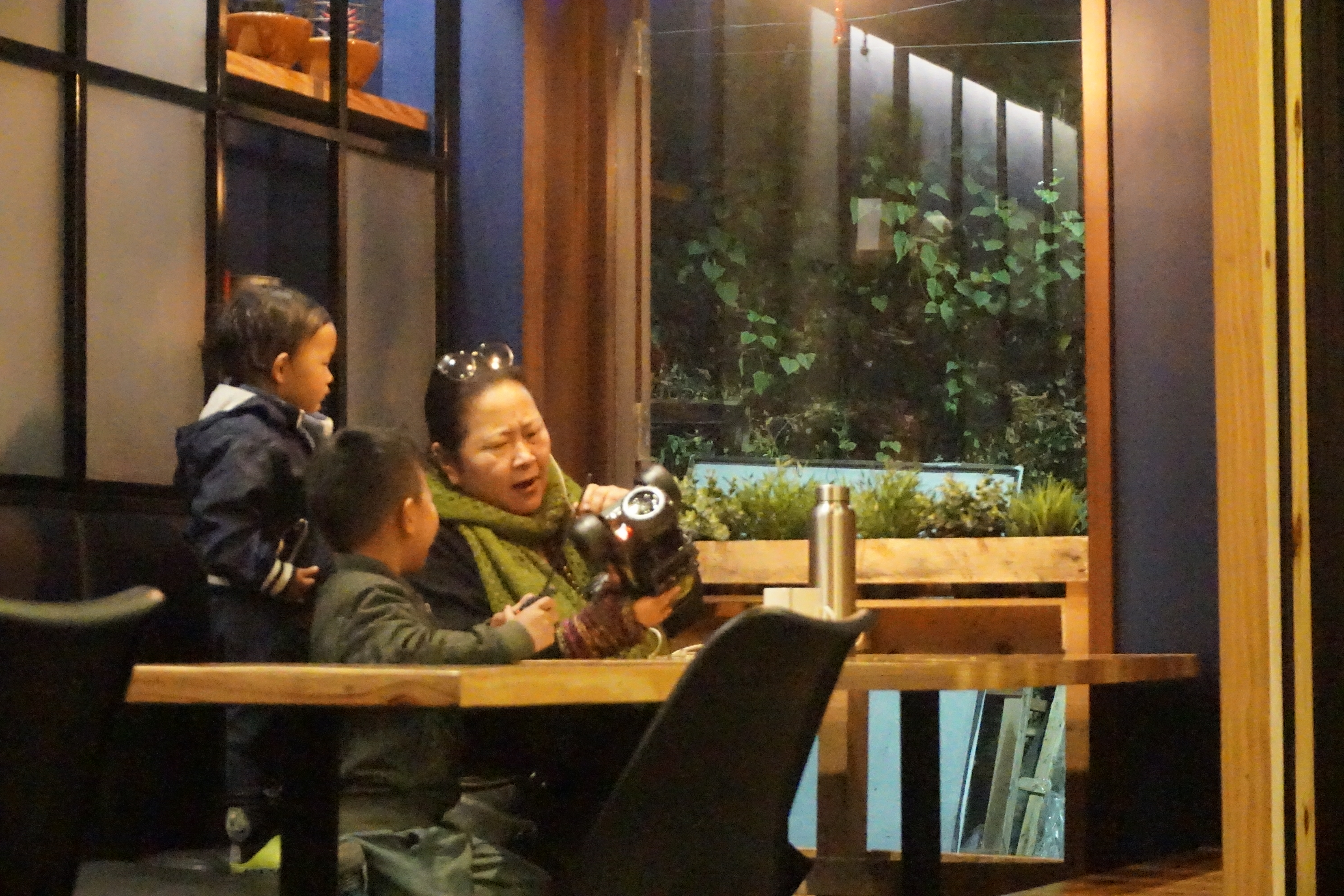 The two kids of the owners of Little Llama cafe (not in the picture) played with a remote-operated toy.