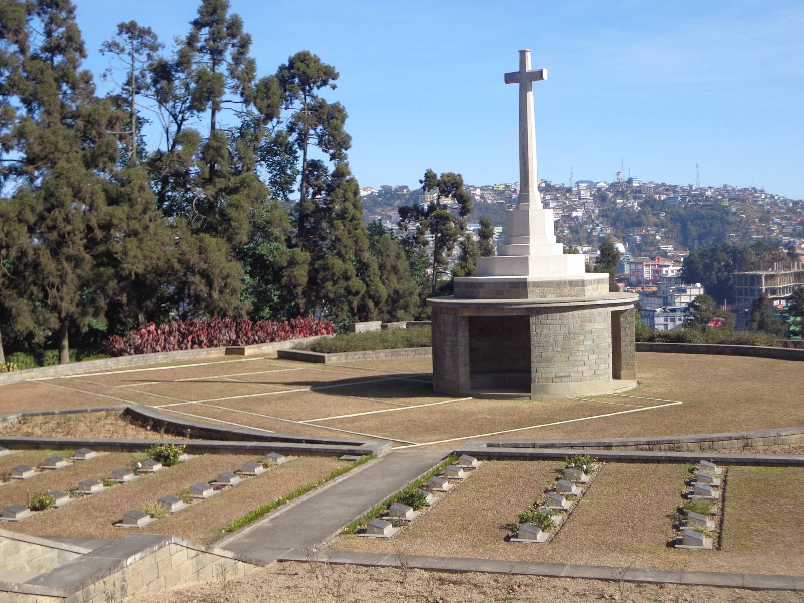 A large memorial with the tennis court where innumerable British and Indian fighters defended the land from the Japanese.