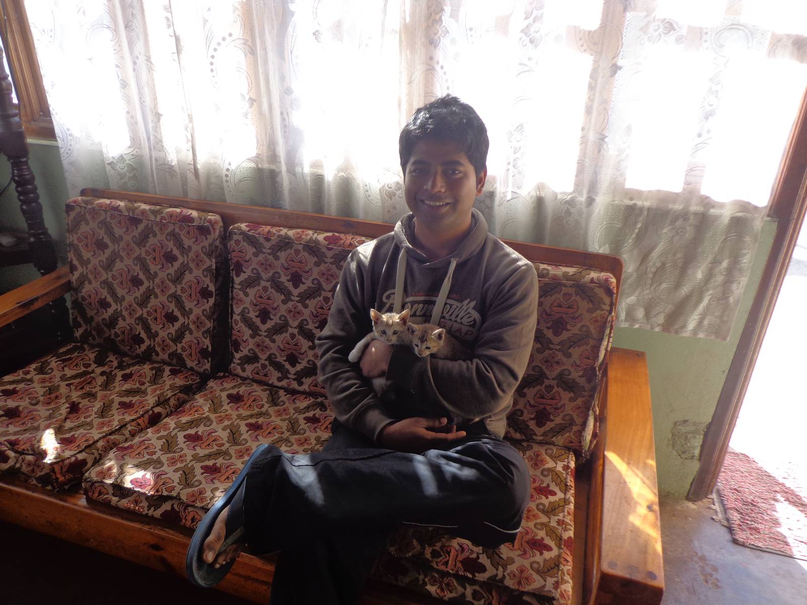 The Lalhou household had quite a few kittens. Here&rsquo;s me with two of them.