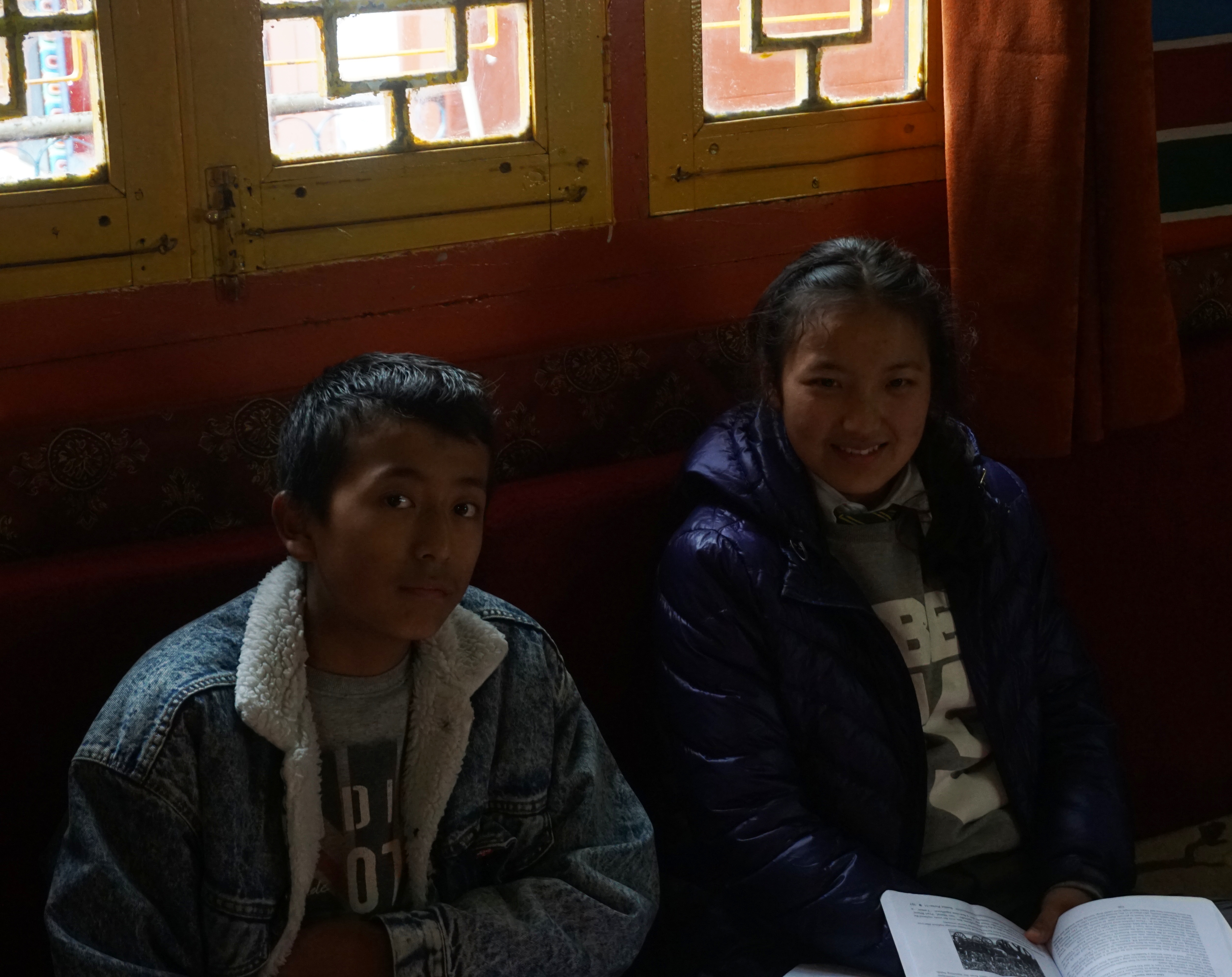 Two kids, who were doing their school work inside the temple, agreed to pose for a photograph.