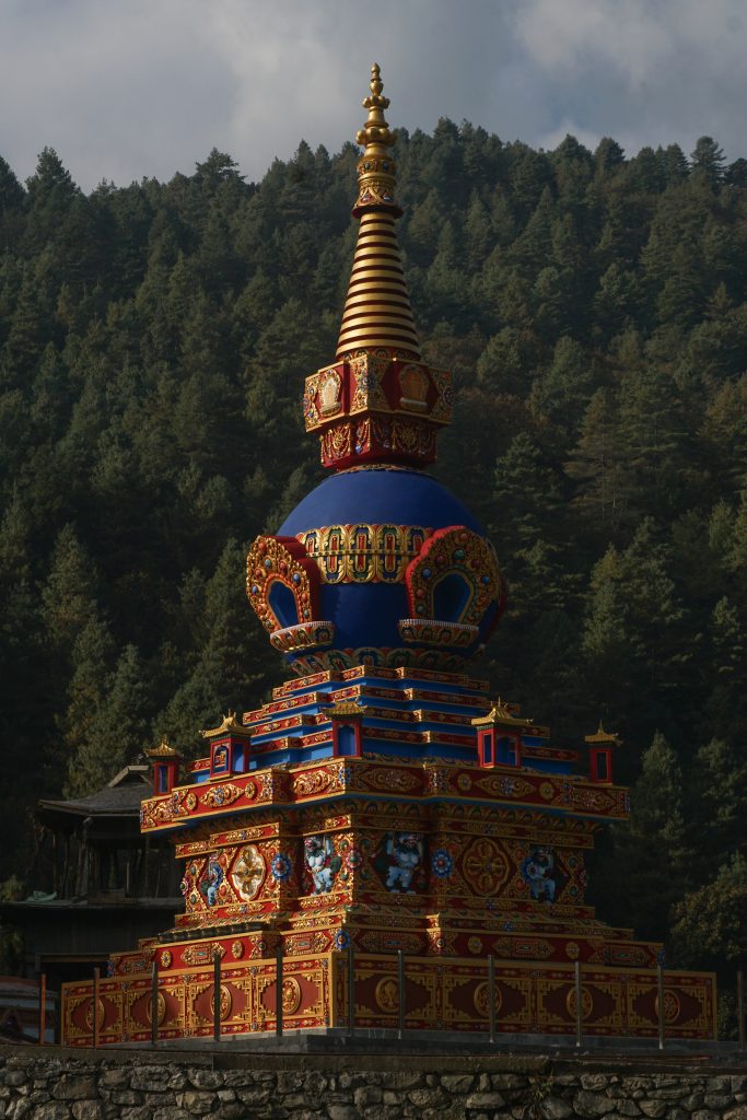 A colourful chorten adjacent to the monastery.
