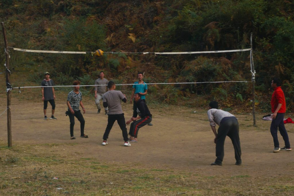 Youngsters playing volleyball in Dirang village.