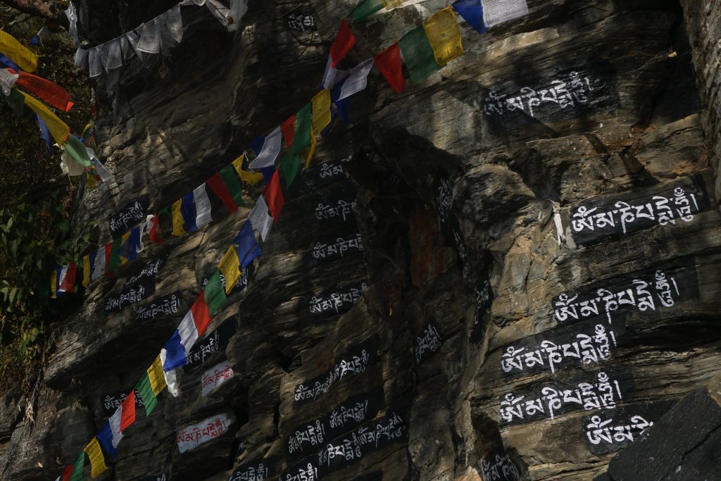 Mani prayers are painted on rock faces everywhere..