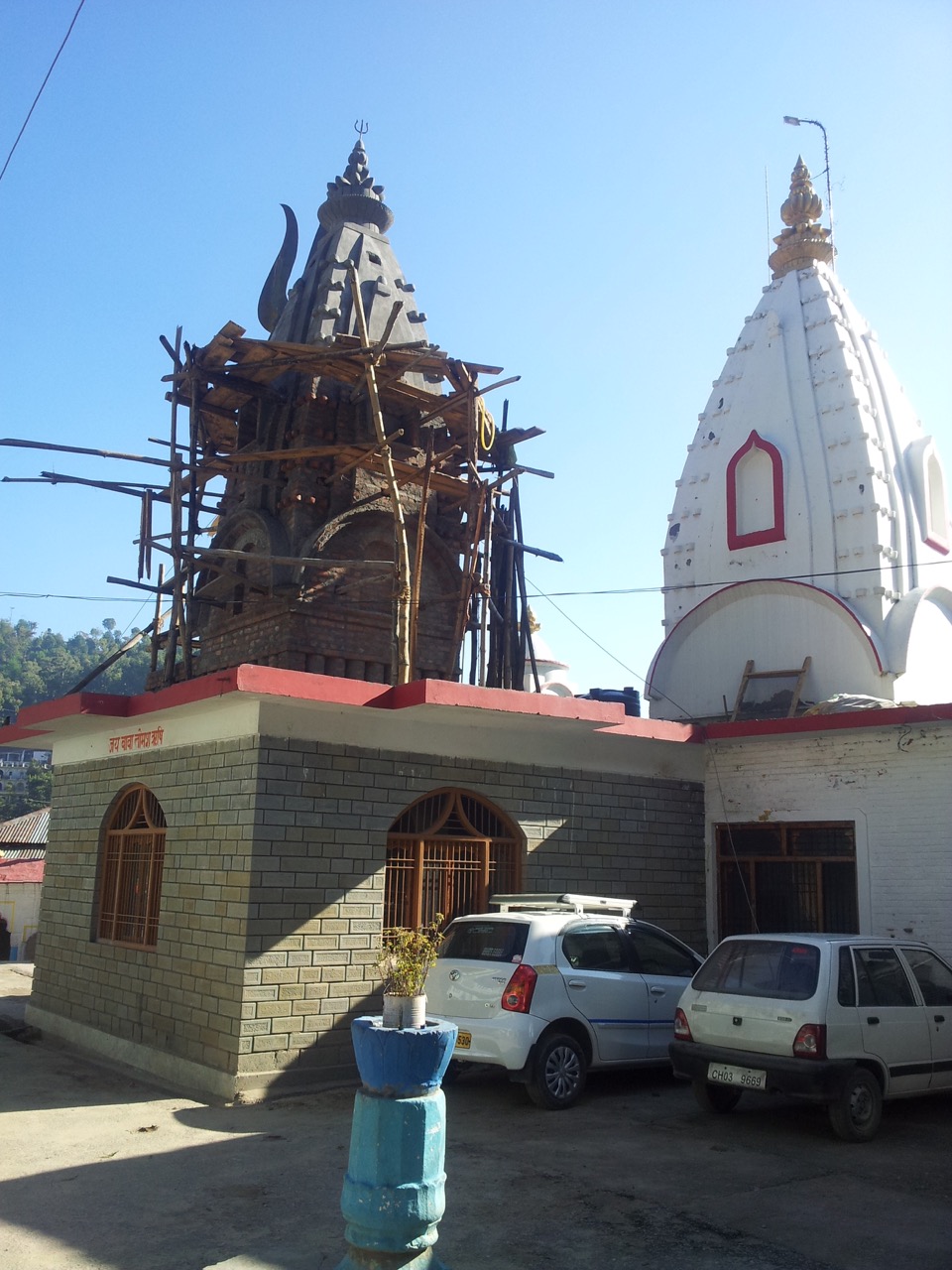 The spire of a Shiva temple was under construction, too.