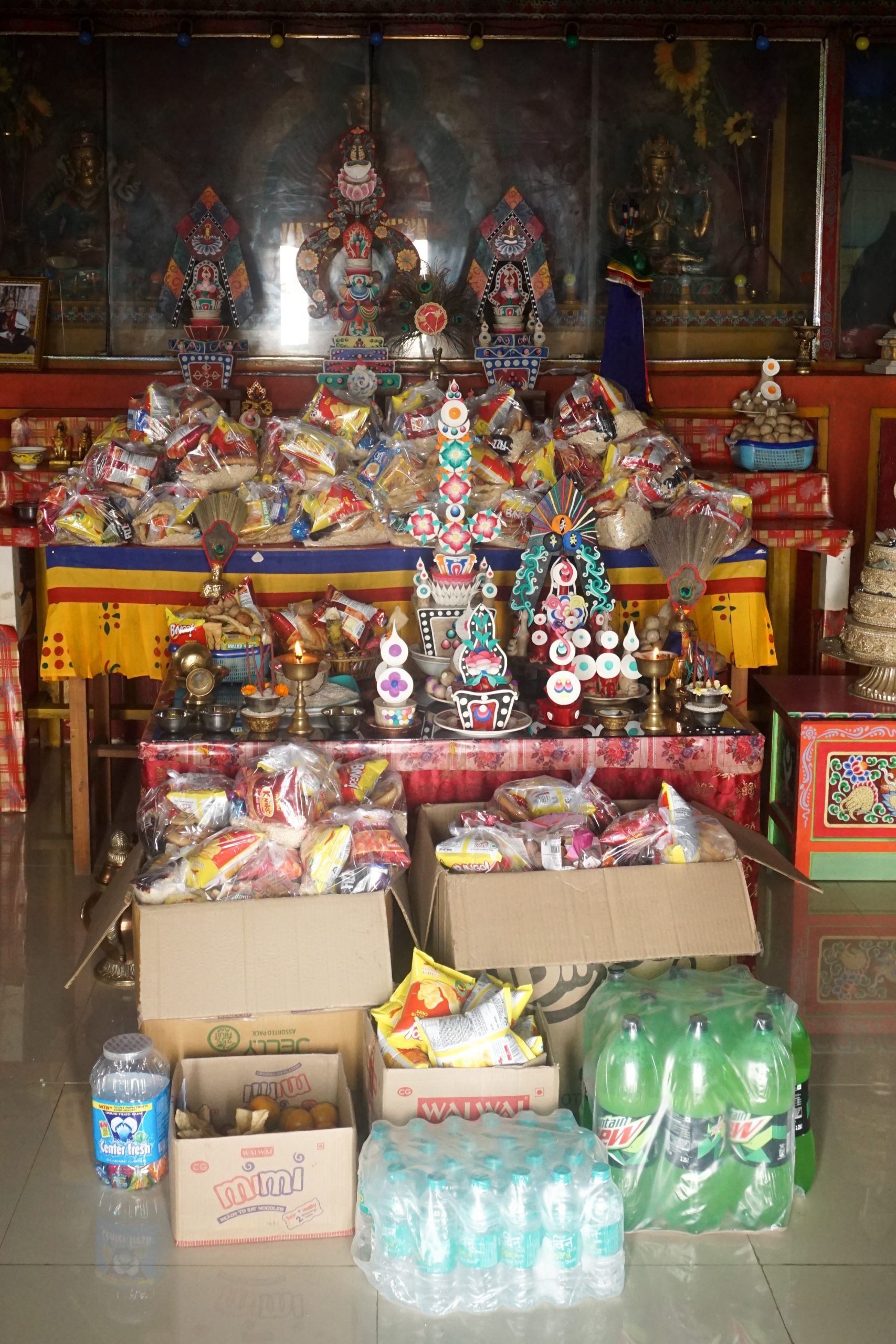 There was a lot of packaged goods kept as offering inside the prayer hall.