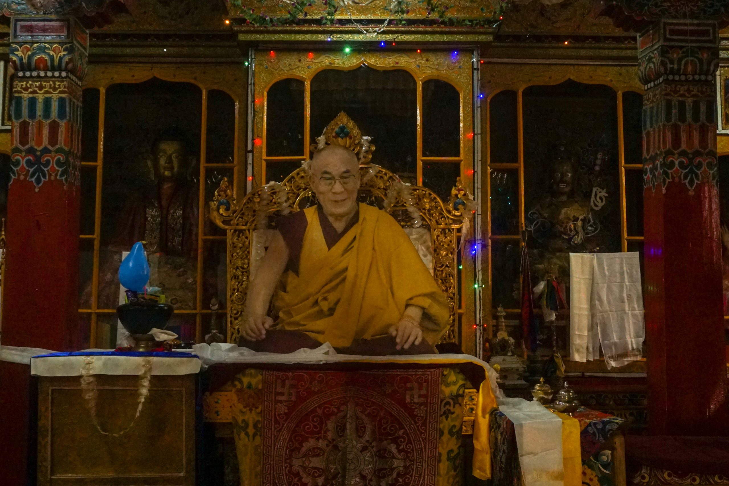 The prayer hall had a large cutout of the Dalai Lama inside.