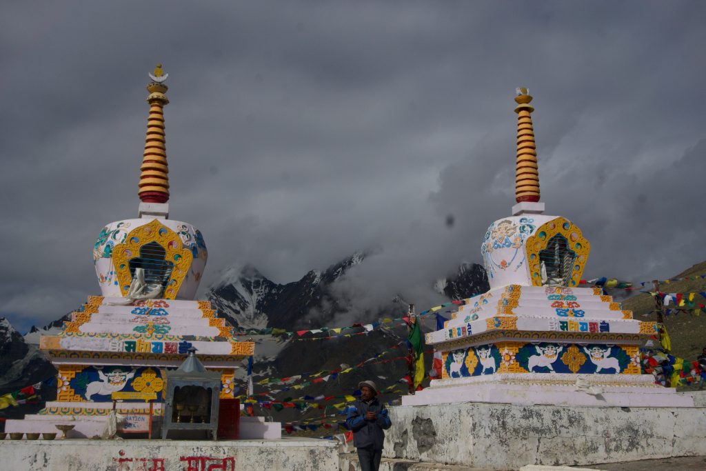 The bus stopped at Kunzum stupas. The place was already crowded. There were no villages or settlements nearby—just the stupas and the mountains. Yet, people came there to pay a visit and offer prayers.