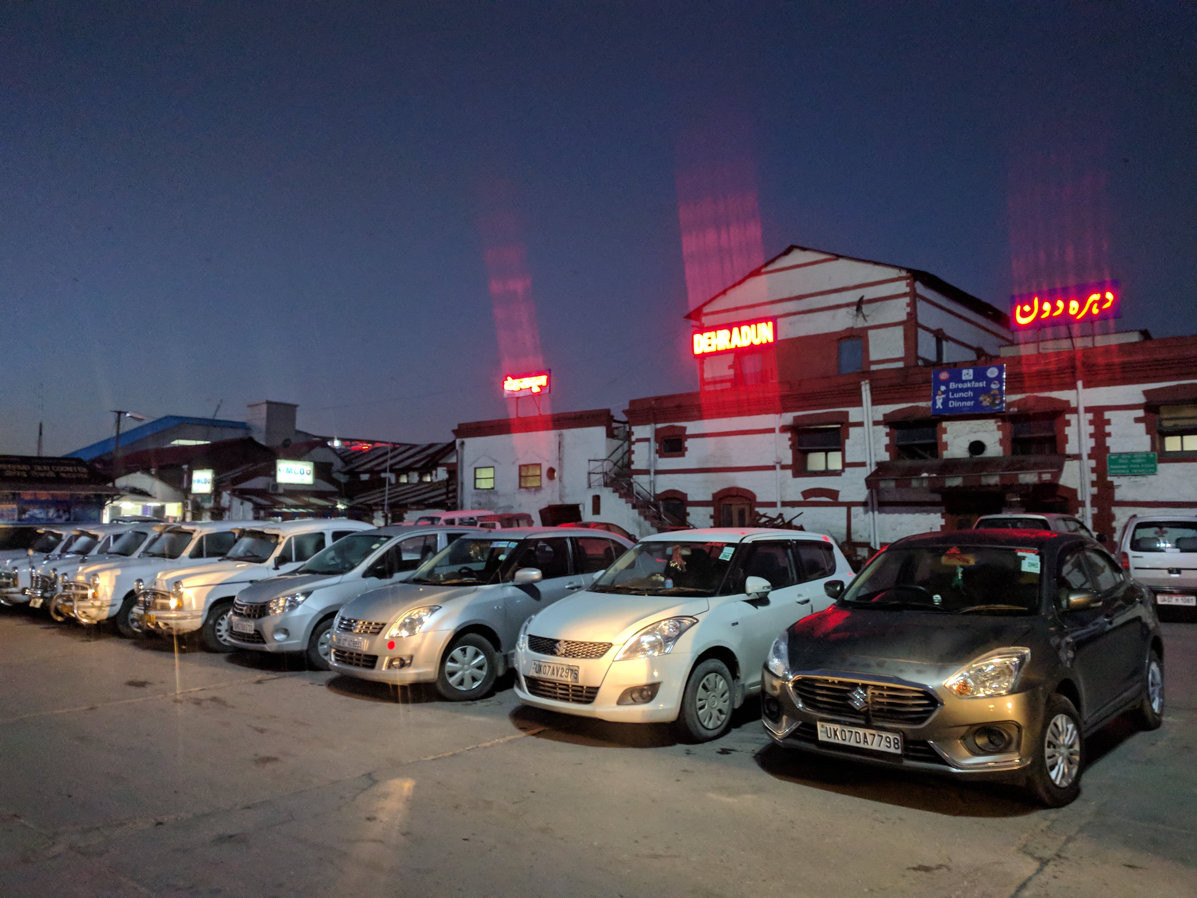 Dehradun Railway Station at 6:30 AM.