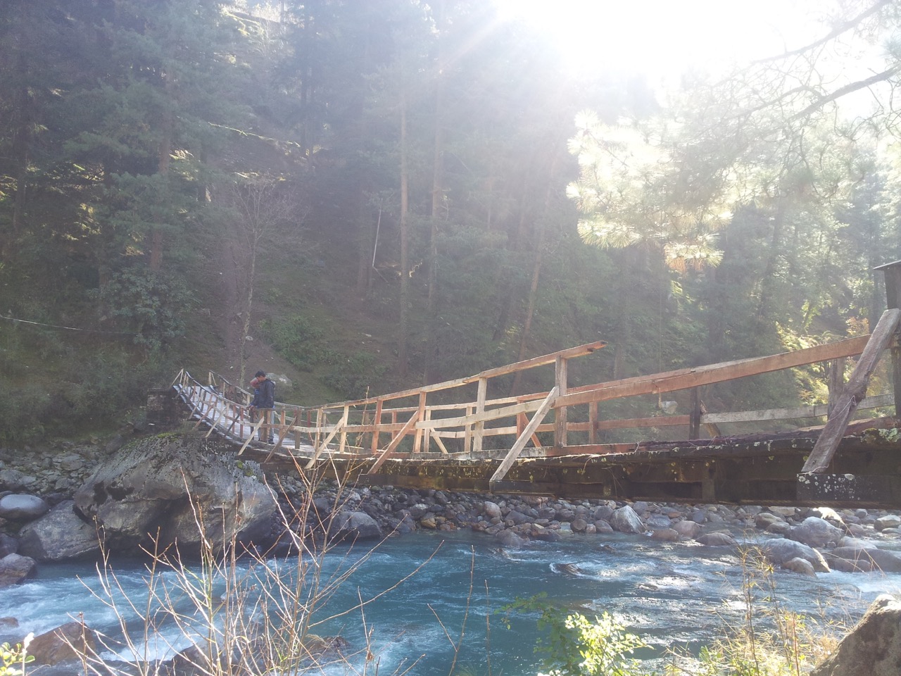 I crossed this wooden bridge and asked the two men for directions.