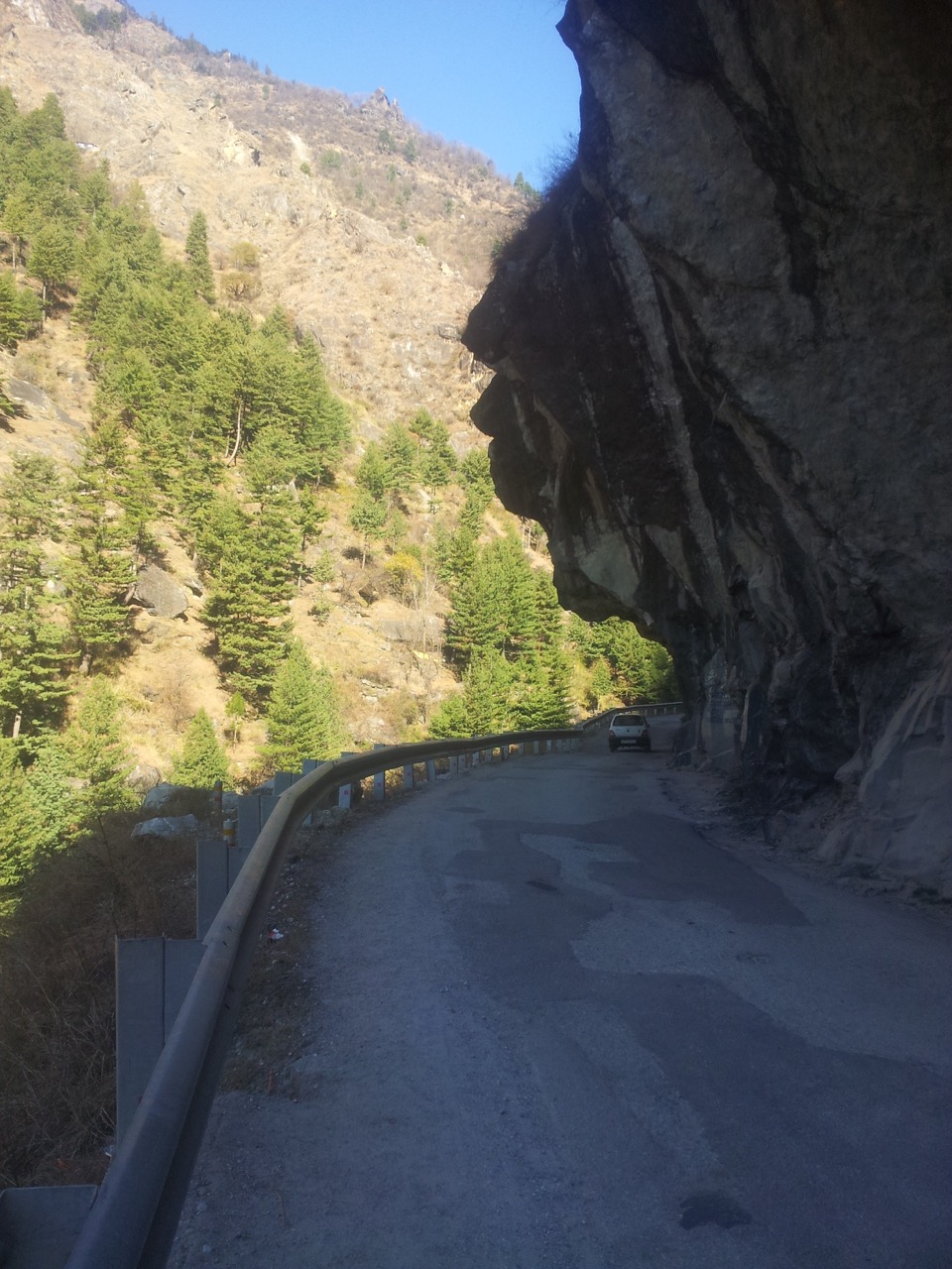 Rock overhangs like this not only reduces clearance for large vehicles but also cause visual barrier to any incoming traffic.