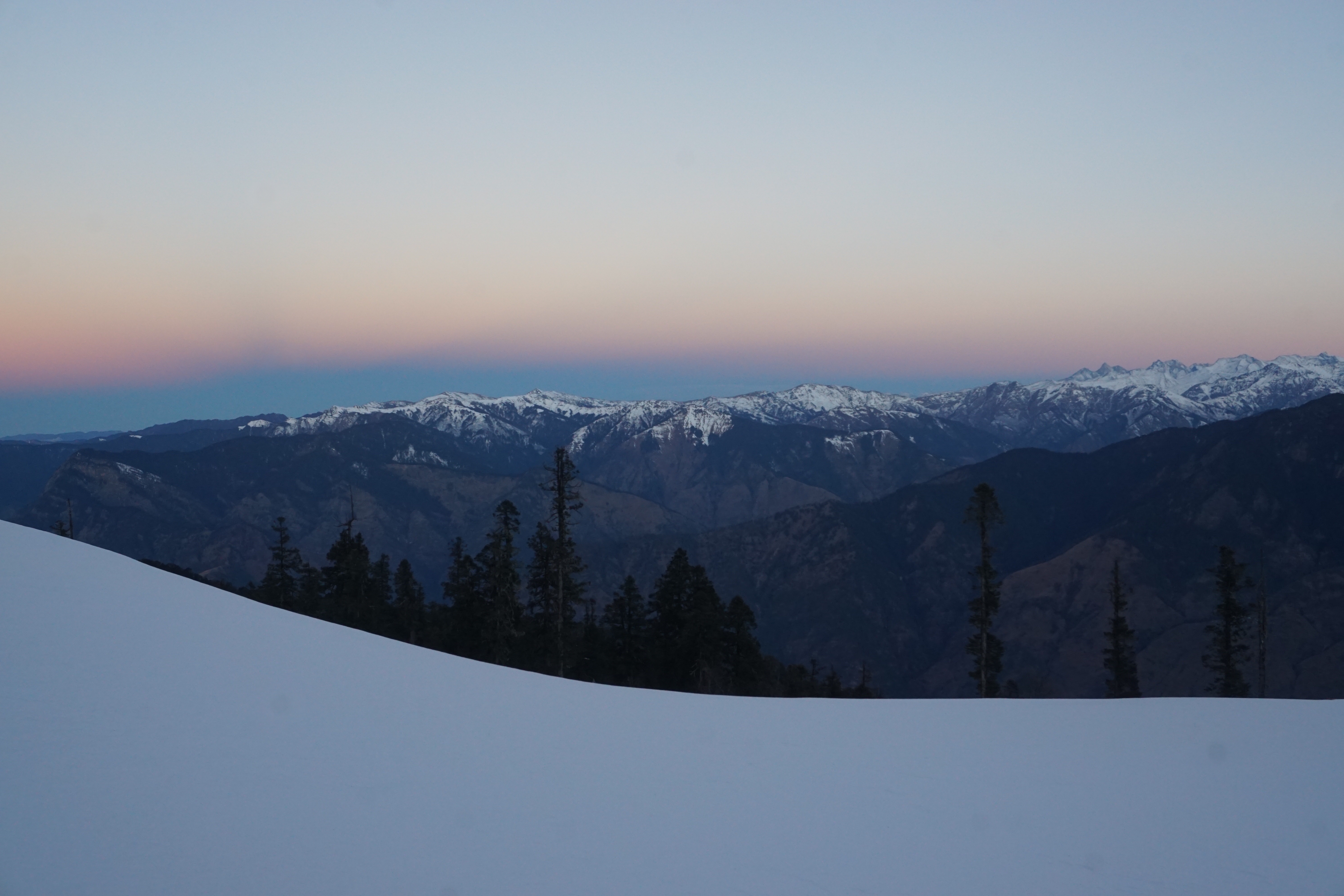 Along our way, as the sun rose beyond the mountains, the sky was filled with colours—like a horizontal rainbow. The picture doesn&rsquo;t do much justice to the actual sight.