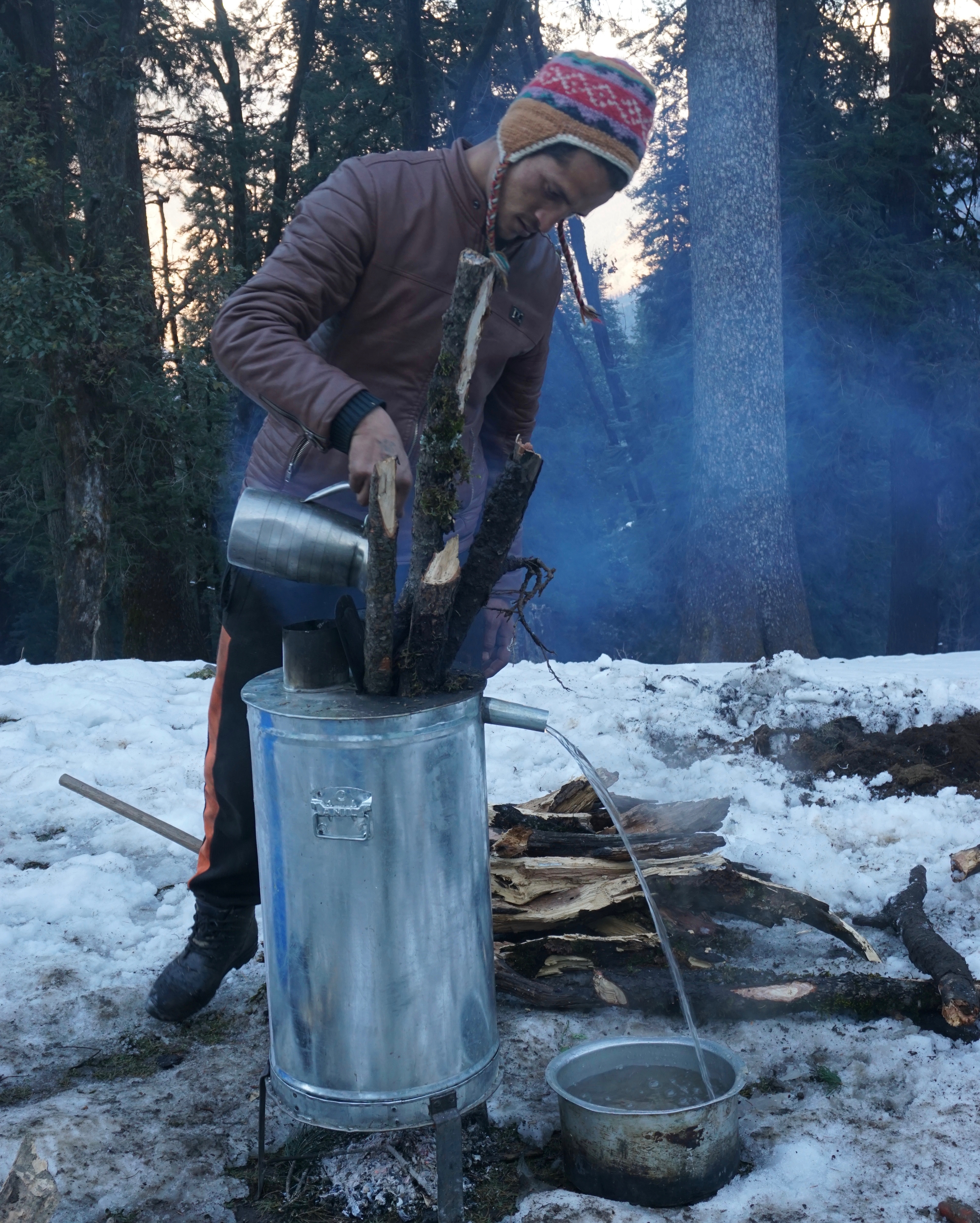 This is a hamam. There are two chambers. One is used to burn the wood and the other for the water. Water is passed through a heated chamber and comes out boiling hot from the other side.
