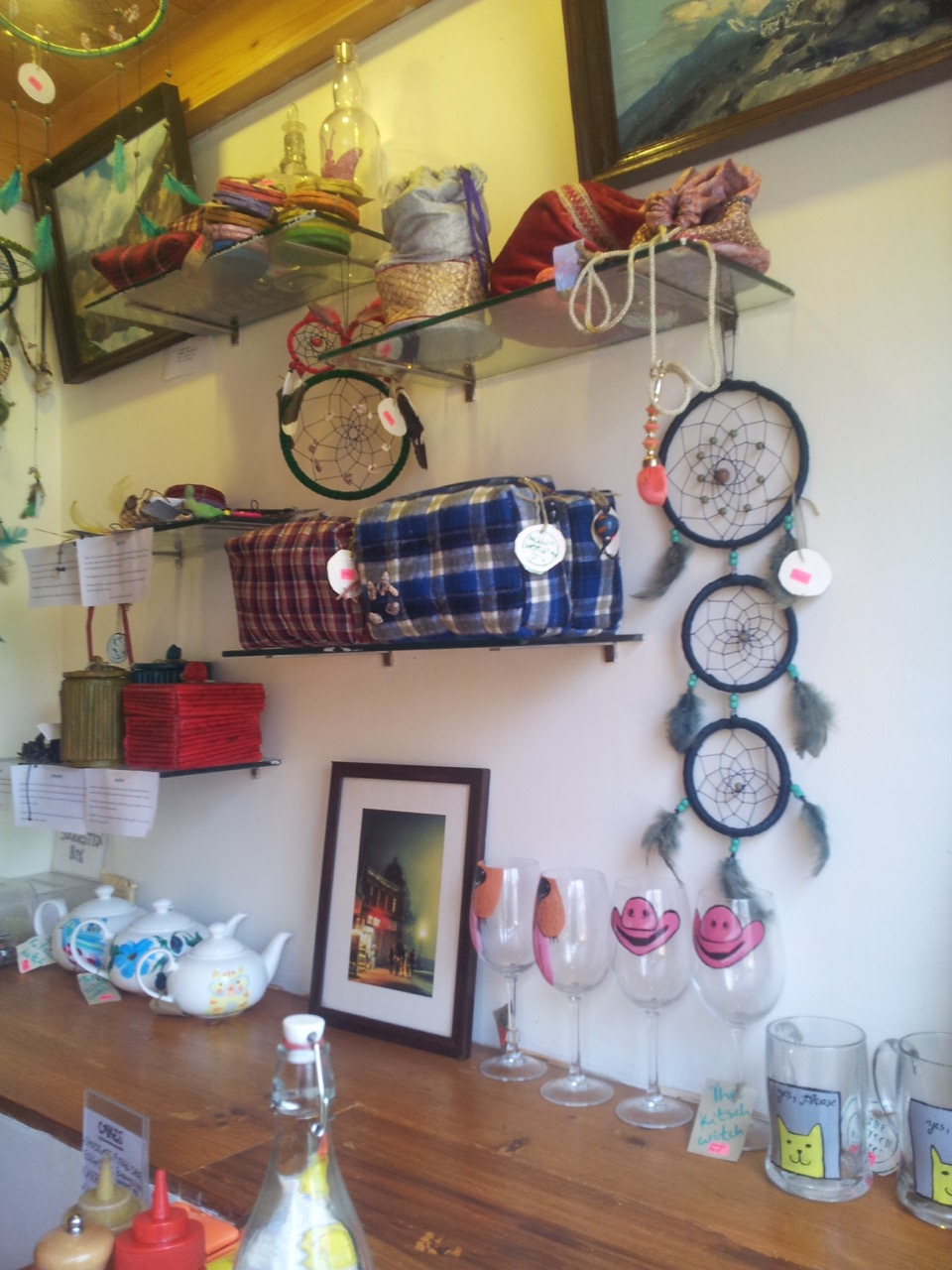 Souvenirs on one of the walls of Wake and Bake for sale.