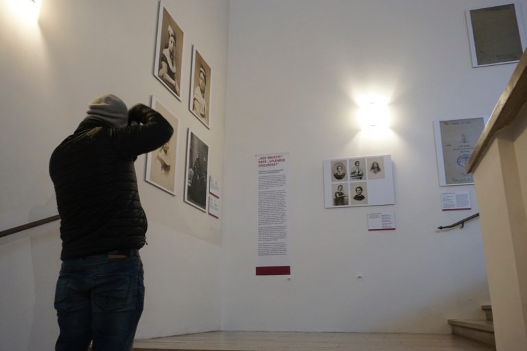 Partho was intrigued by this exhibit. On the left wall are four portraits of Queen Emma of Hawaii. The wall in front has five portraits that had only one portrait of the Queen. It&rsquo;s like a puzzle that the viewer is supposed to figure out.