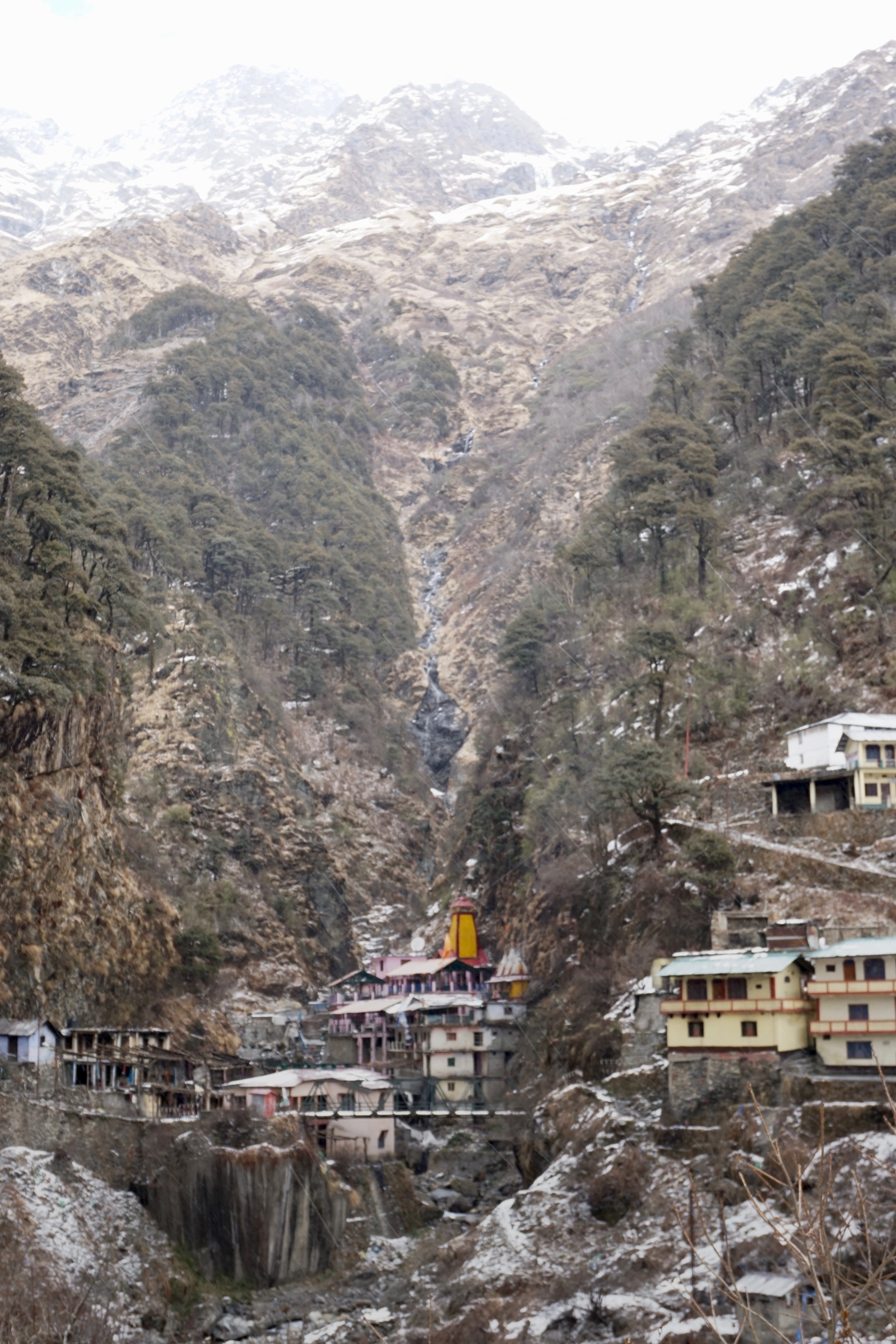 Yamuna temple against a backdrop of the majestic mountains got showered with snow.