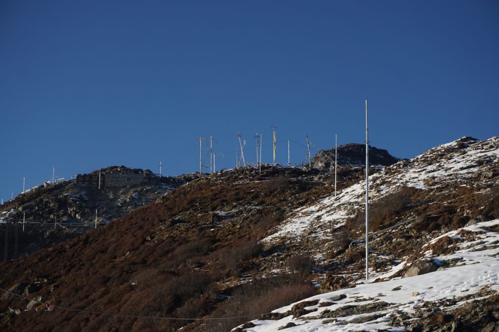 I took this picture while waiting for Kumar to fix his vehicle. This was my first encounter with snow in this trip.