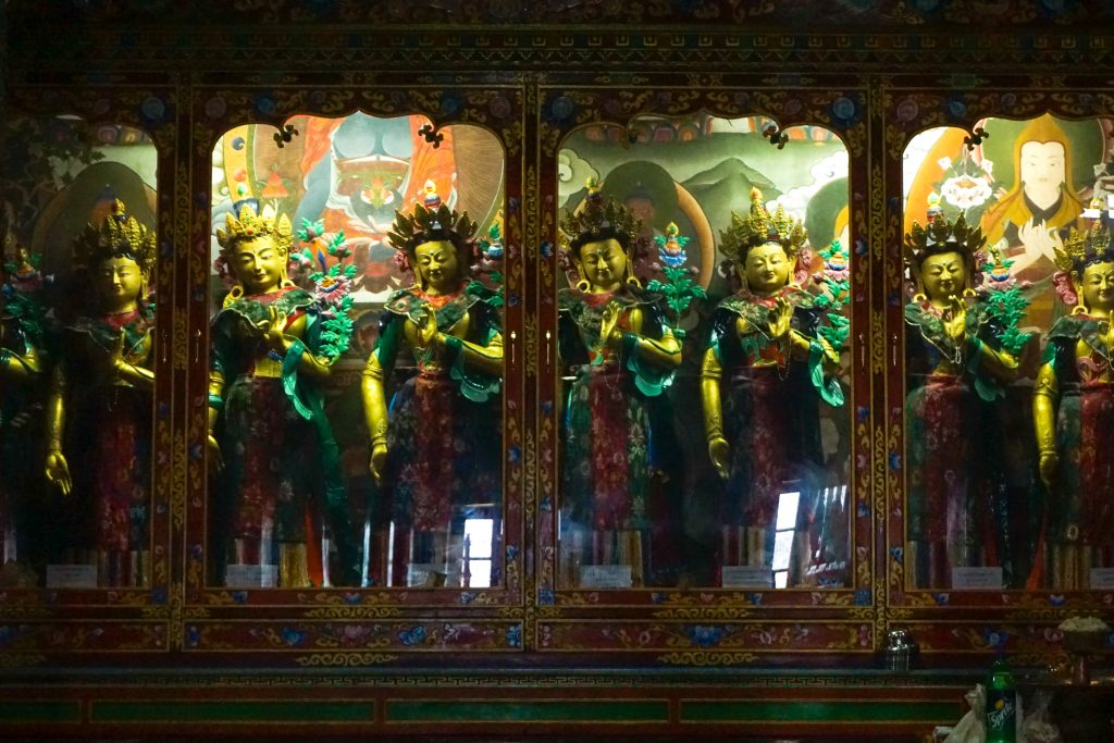 The many Buddhas inside the prayer hall.