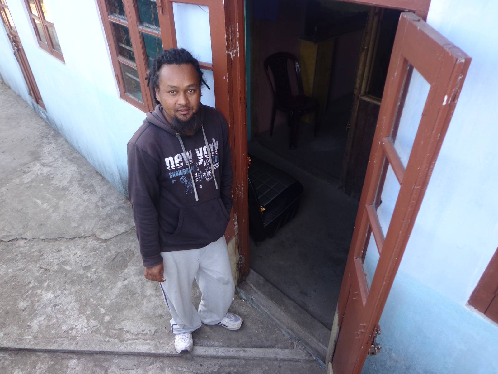 Haprit in front of one of the dorms.