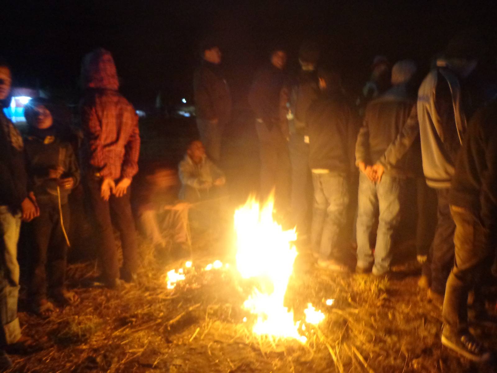 Localites enjoying the music beside a bonfire. They had to pay only 200 as compared us outsiders, who paid 500 each.