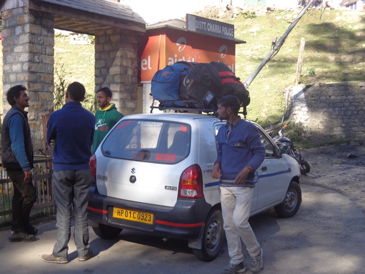 The bags on top are packed with paragliding equipment.