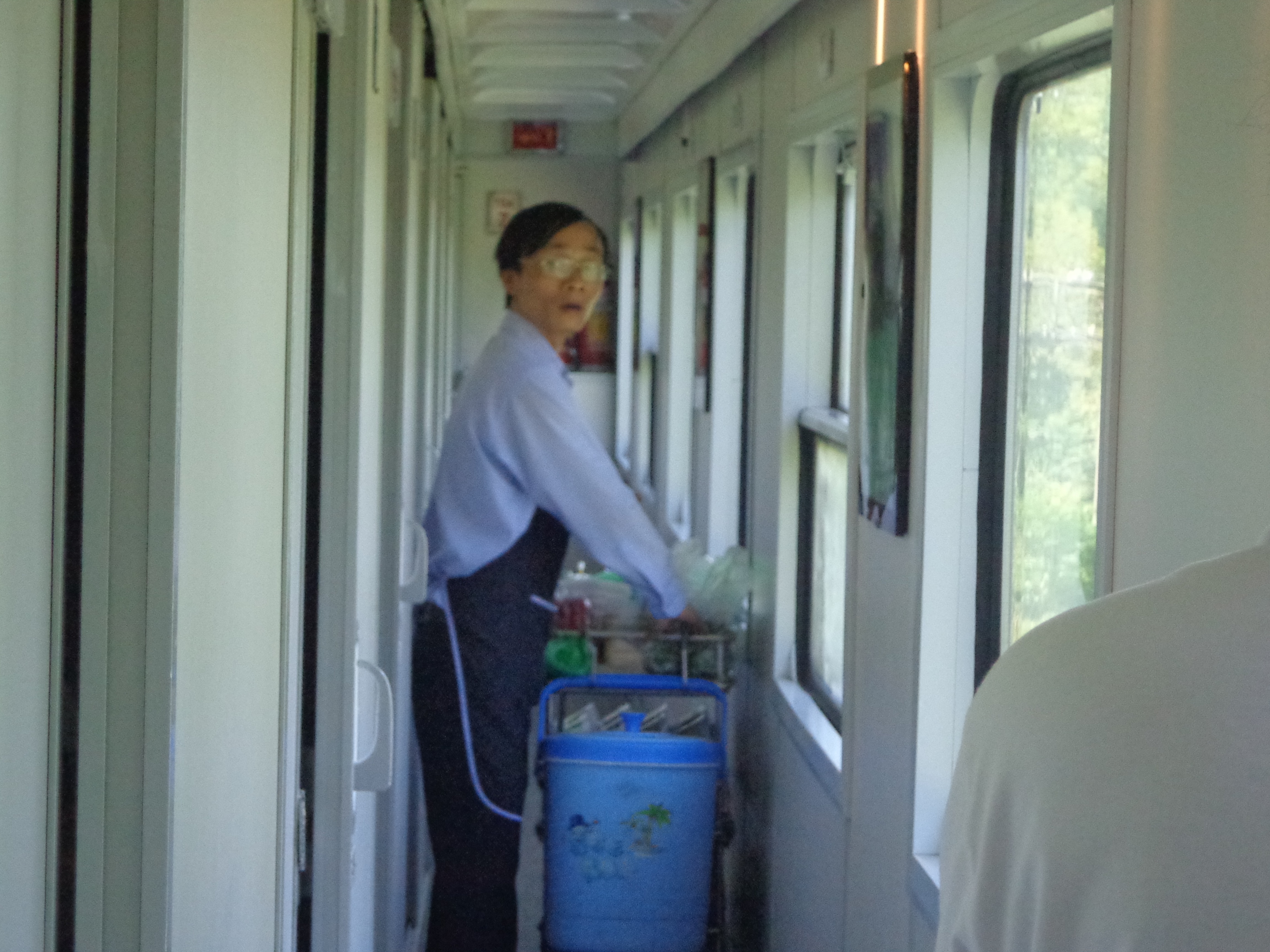 A man selling breakfast items on SE3.