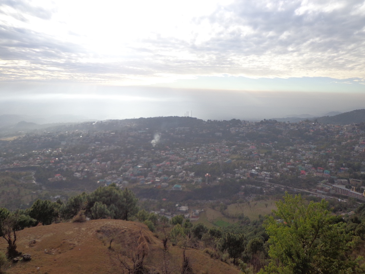 Dharamshala slowly getting covered in the evening mist.