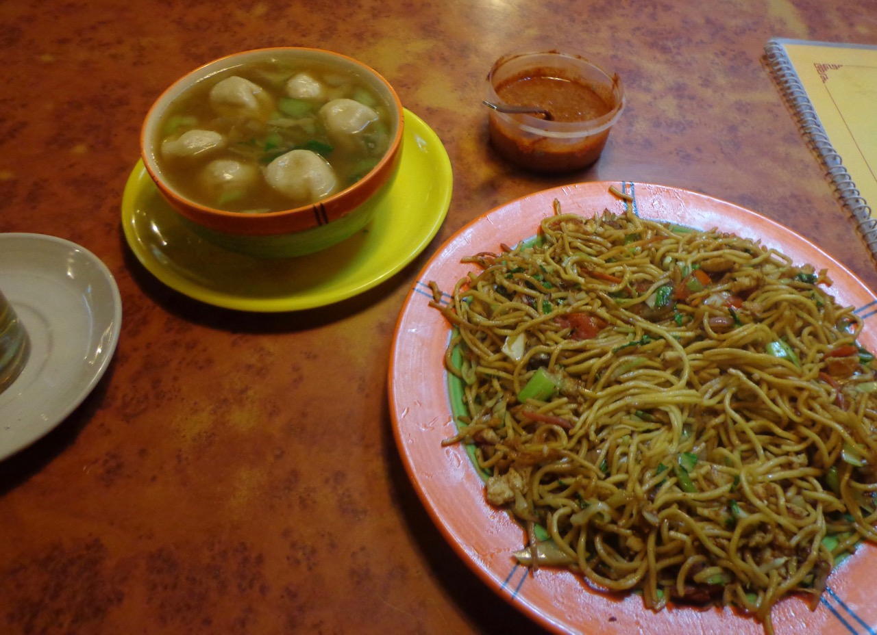 Hot cheese momos in soup and dry egg noodles for my dinner.
