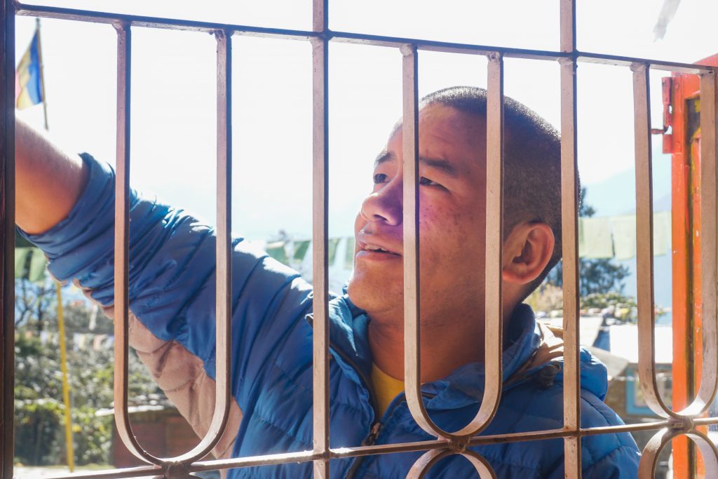 Lama Chimpa cleaned the windowpanes and conversed with me while I sat on the floors of the prayer hall.