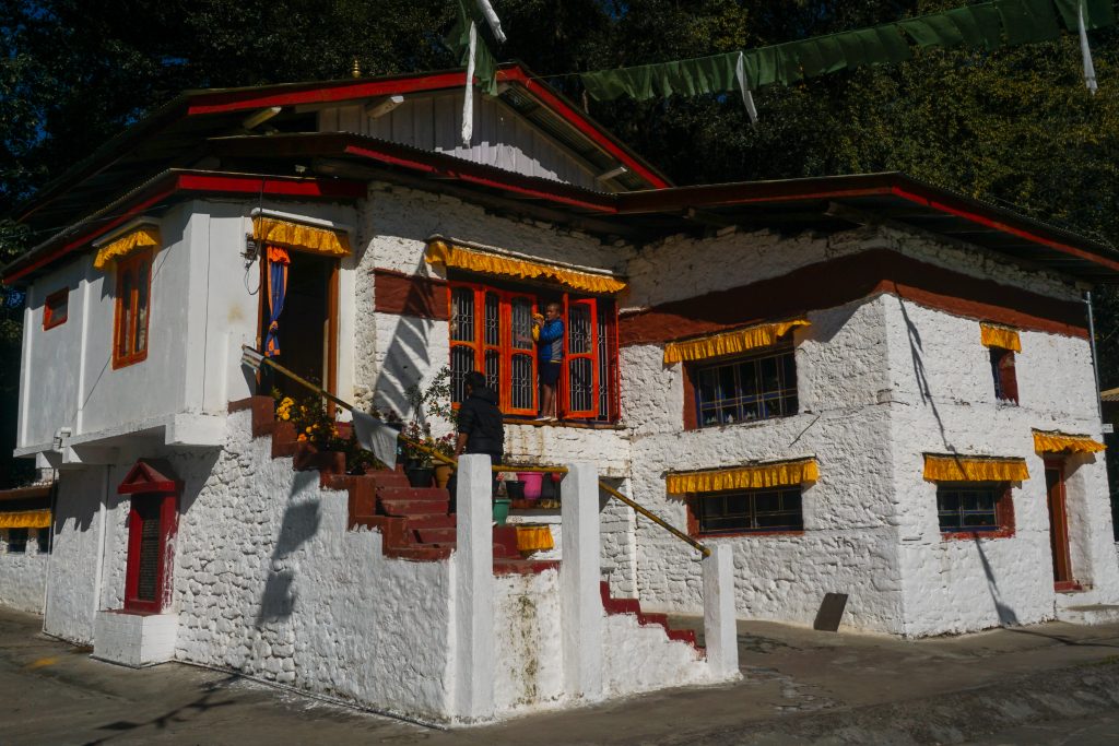 Urgeling Monastry. The prayer hall is on the first floor. The entrance on the ground floor (right) leads to the chapel of protective deities along with a series of chortens.