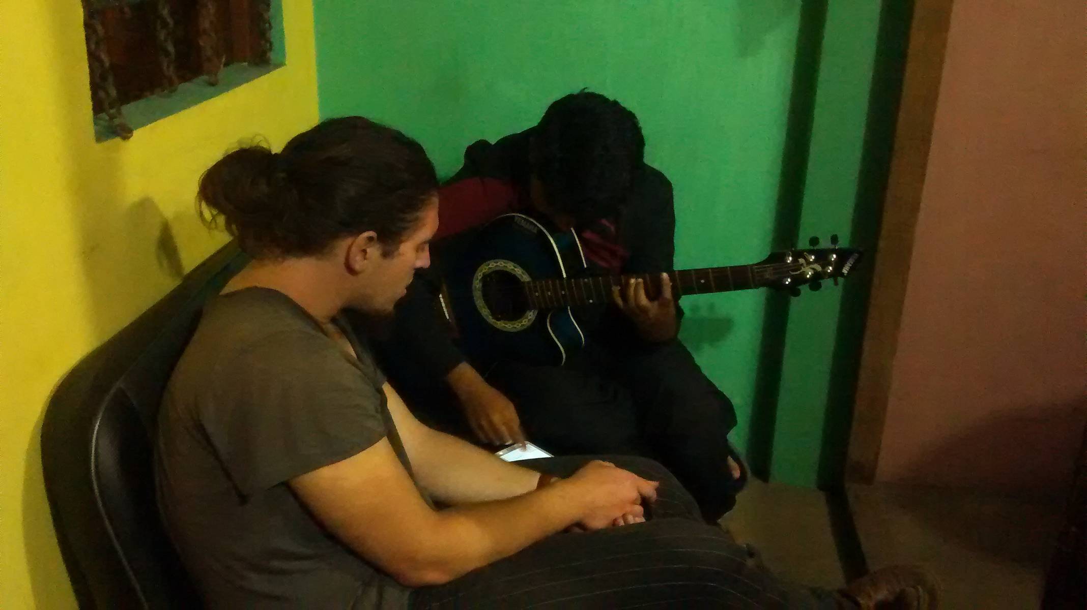 Greg came by when he heard me playing the guitar. It wasn&rsquo;t my playing but the existence of a musical instrument that attracted him there. Image courtesy: Gowri Sankar.