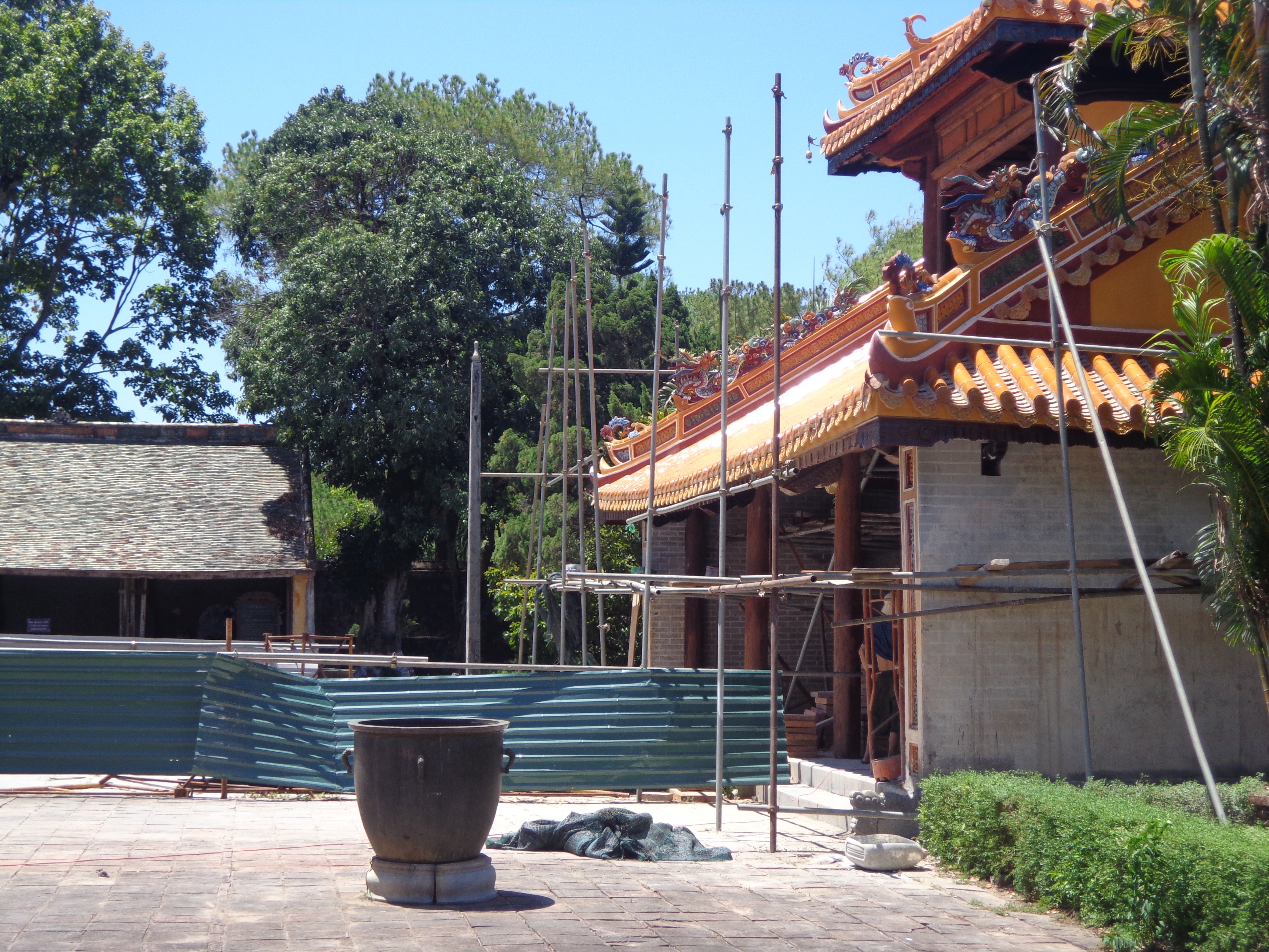 A part of Tu Doc&rsquo;s tomb site being renovated. Such renovation works are in progress throughout Hue&rsquo;s archeologically significant places.