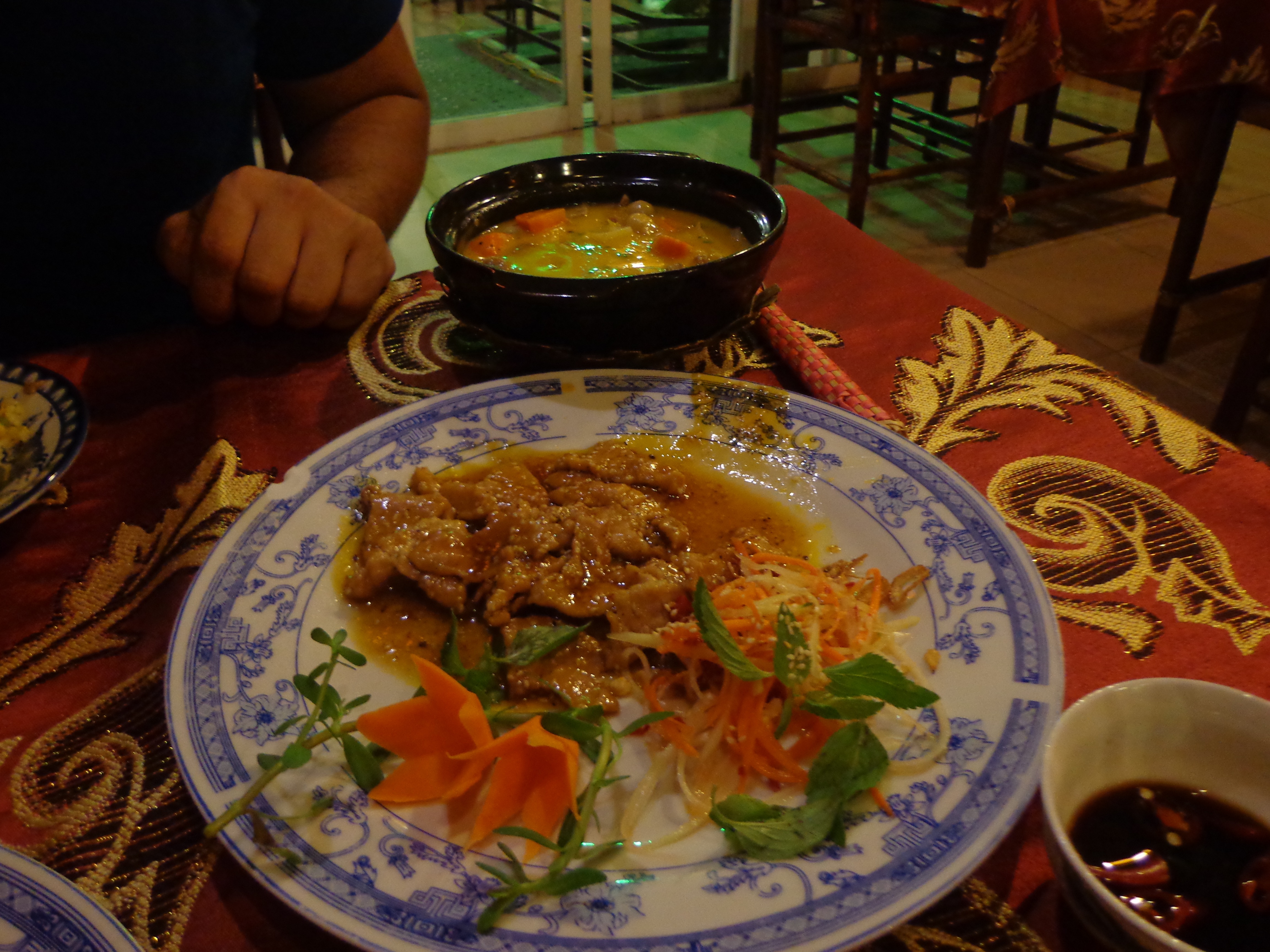 Caramelised pork in sesame seeds and Beef stew. With coconut milk, the latter tasted like something we could get in Kerala.