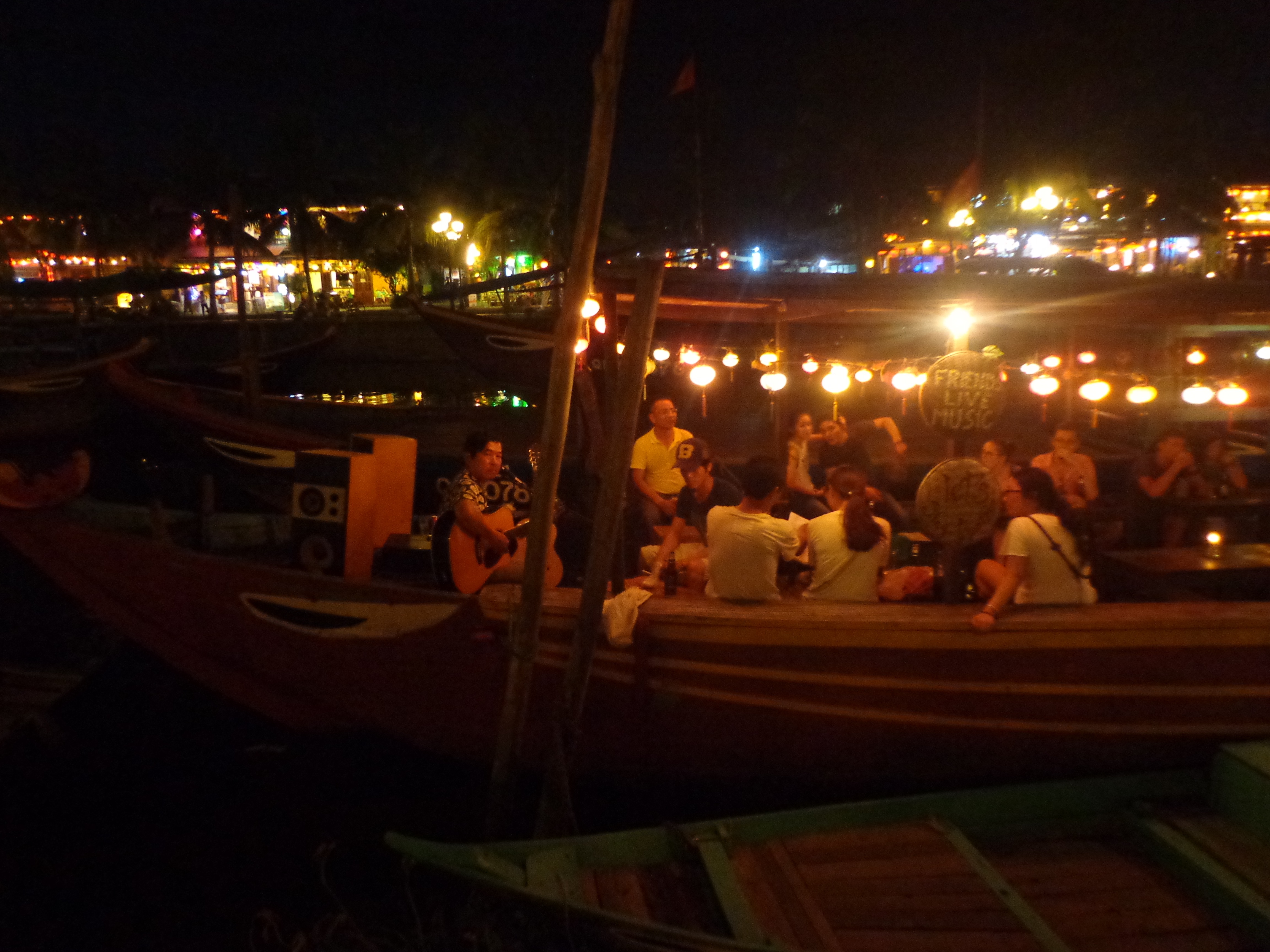 Musicians playing live on a boat restaurant.