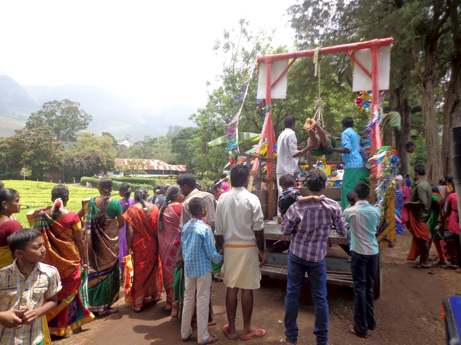A devotee in Superman suspension
