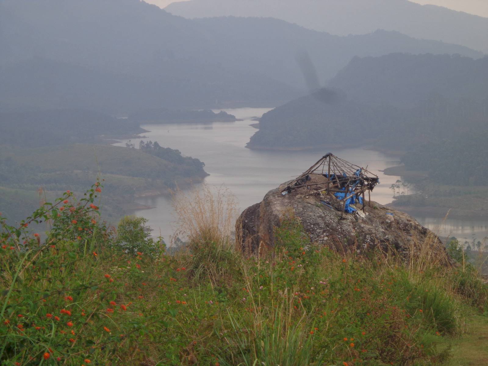 Anayirankal Dam covered in mist. We sat on the boulder in the foreground and enjoyed the weather.