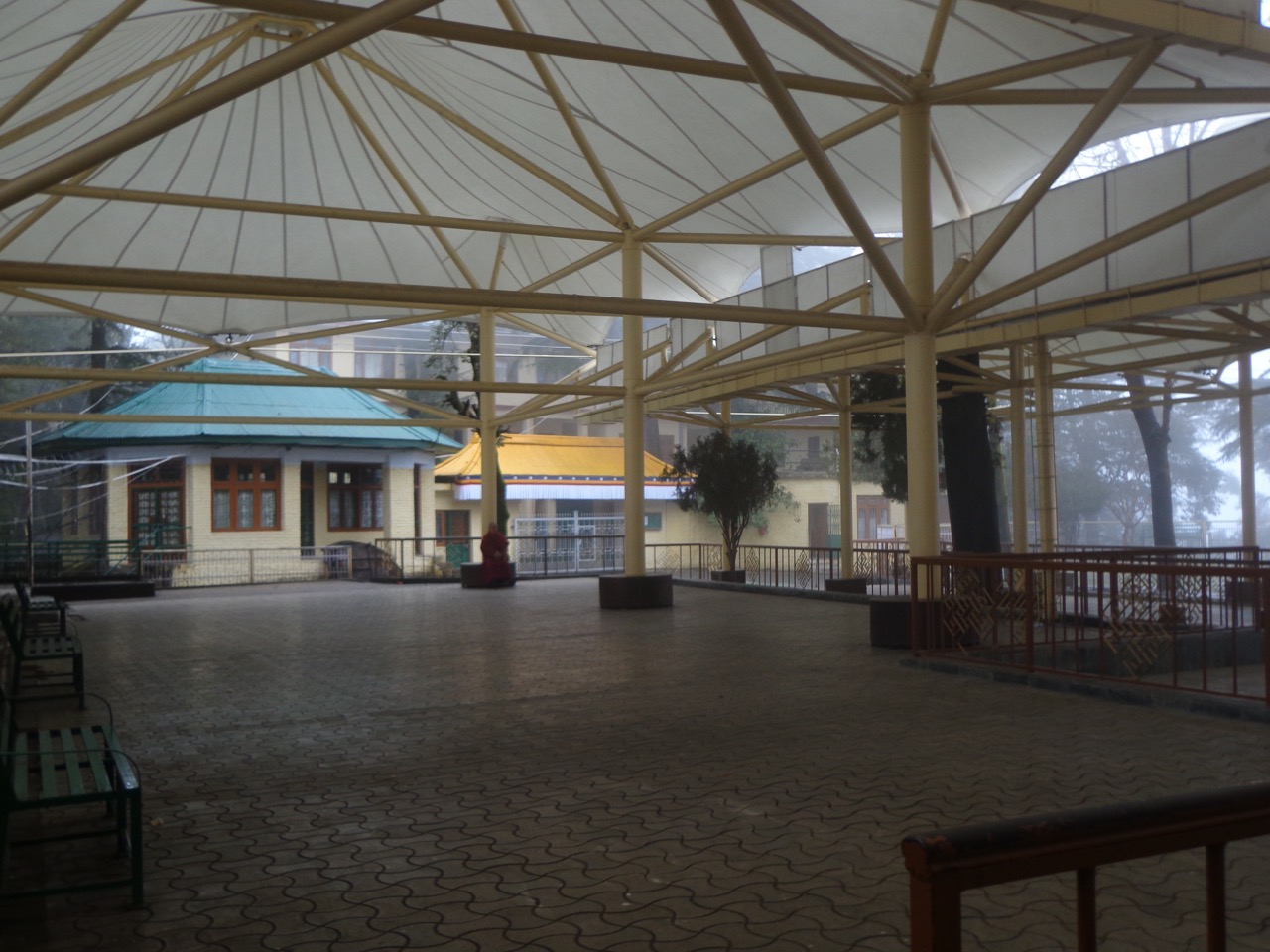 The residence of Dalai Lama is partially visible through the courtyard. Photography of his residence is prohibited due to security reasons.