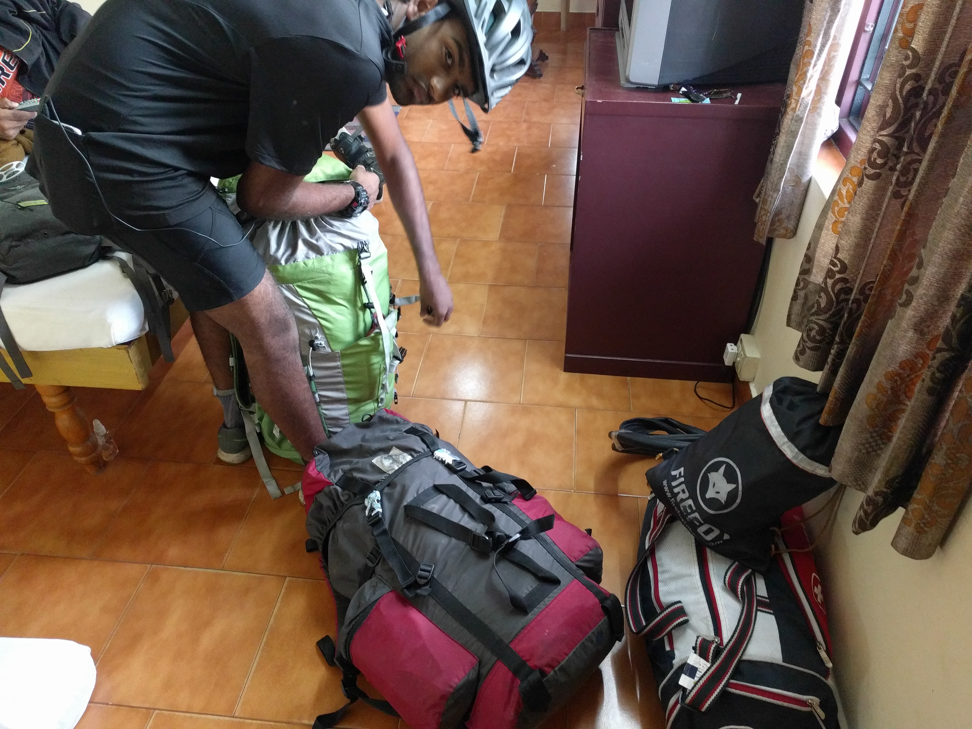 Siddharth packing his bags for one last time. This had become our daily routine.