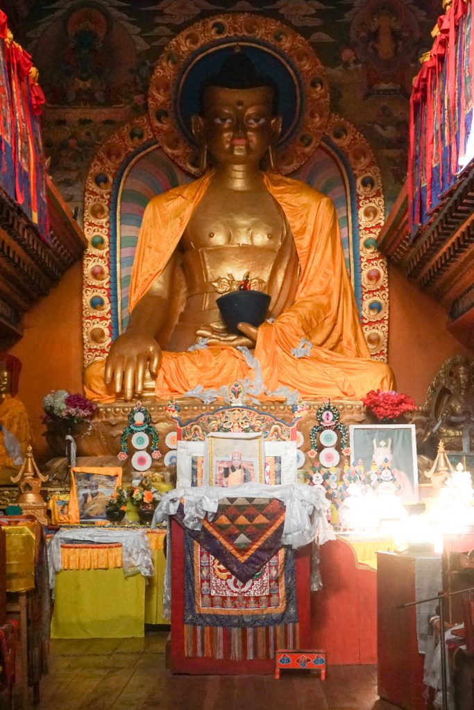 The Buddha statue in the first floor prayer hall of the larger (and presumably newer) Monastery building.