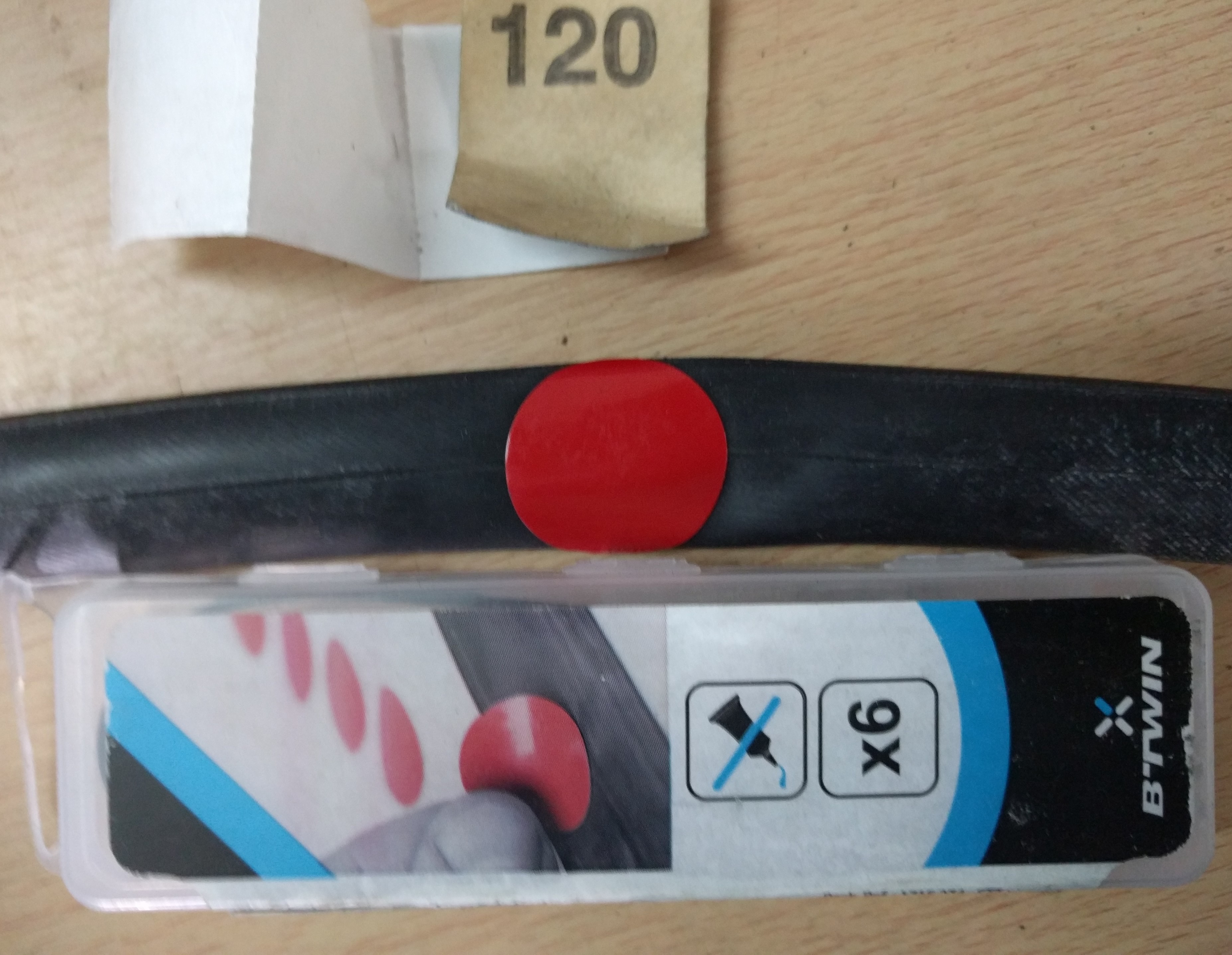 That was the last BTwin patch I had. This repaired tube goes back into my saddle bag.