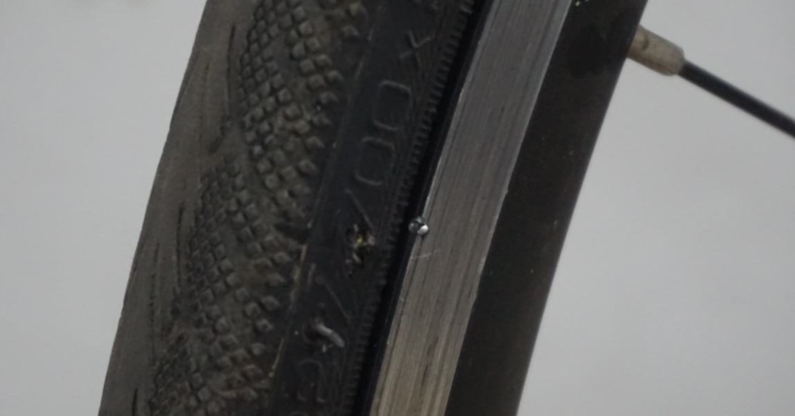 The culprit was something hard and sharp. It had managed to even notch the edge of the rim. Maybe it&rsquo;s time to invest in a pair of Gatorskin Hardshells.