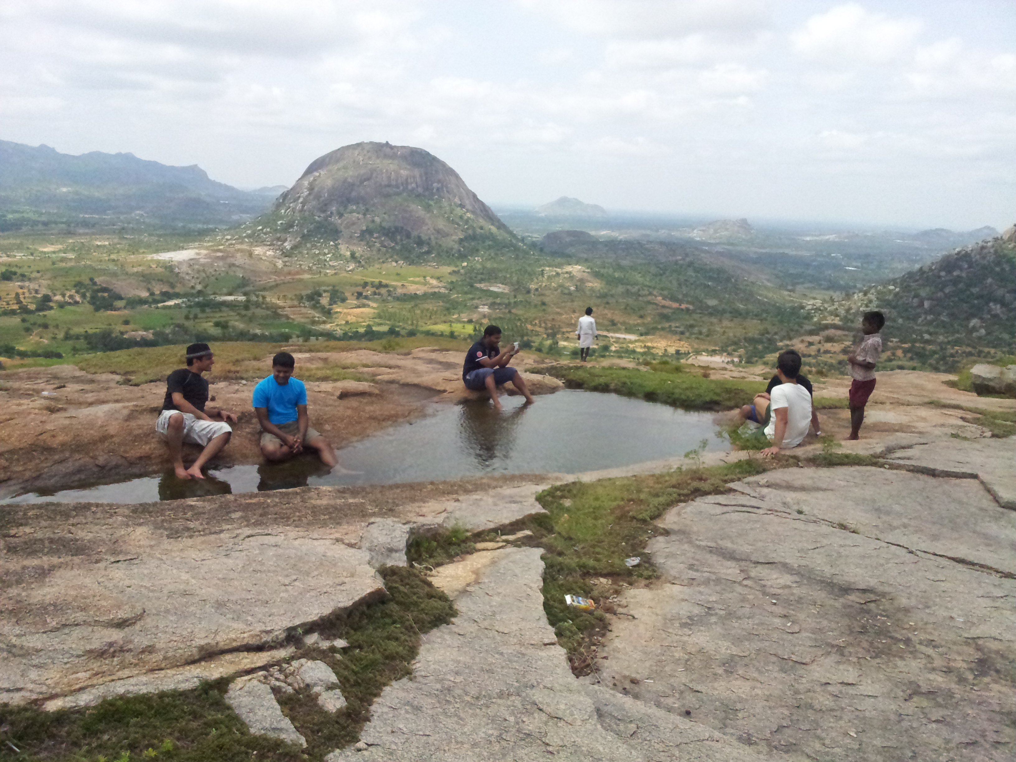 The puddle atop the hill.