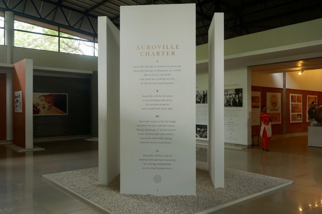 Visitors&rsquo; information centre neatly exhibited the history and philosophy of the place. The Charter was displayed prominently at the centre in four languages—French, English, Hindi and Tamil.