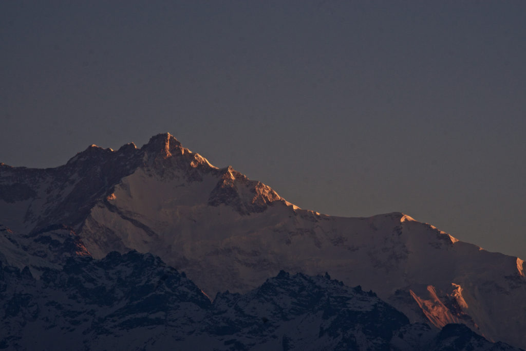 The first rays of light on Kanchendzonga.
