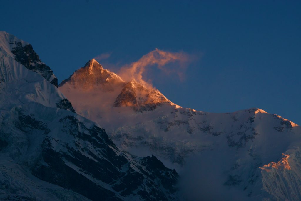 The first rays of sun hit Kanchendzonga and caused the ice to evaporate.
