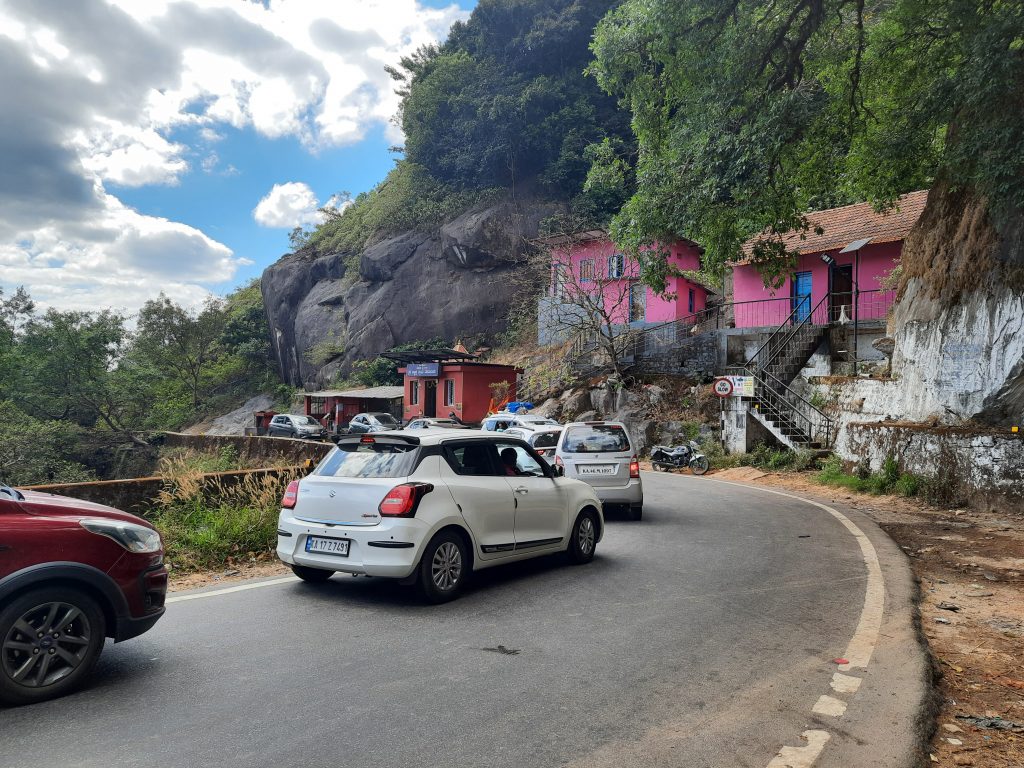 The temple and the vehicle pile-up at Attigere.