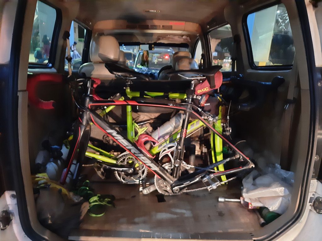 Our cycles, dismantled and placed in the car.