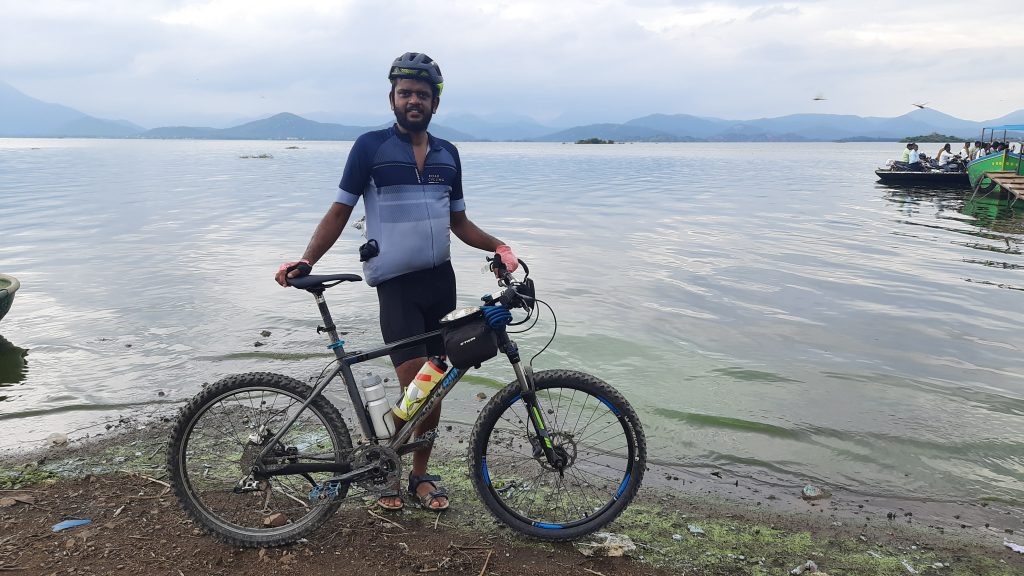 Mittal posing in front of Kavery river.